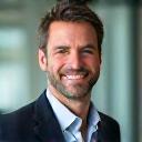 Smiling 45-year-old executive showing confidence.