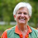 Smiling 52-year-old teacher enjoying an active lifestyle.